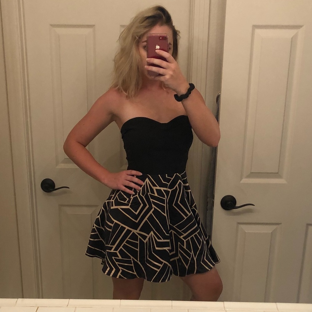 Cute mini black and gold dress